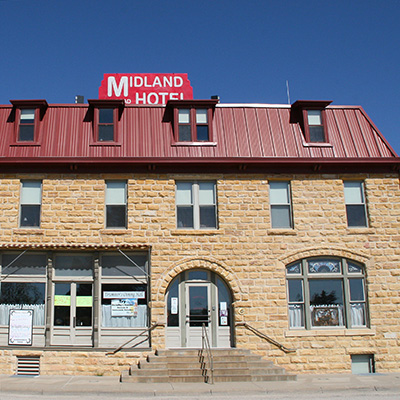 Historic Midland Railroad Hotel / Sample Room Tavern & The Barn